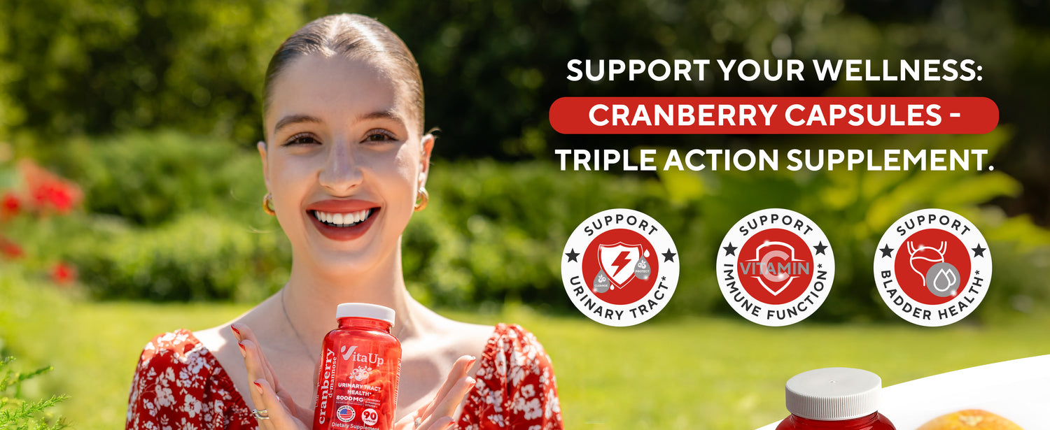 Vibrant banner featuring a cheerful woman holding VitaUp Cranberry Capsules with grapefruit, cranberries, and D-mannose powder in foreground; emphasizes support for urinary, immune, and bladder health