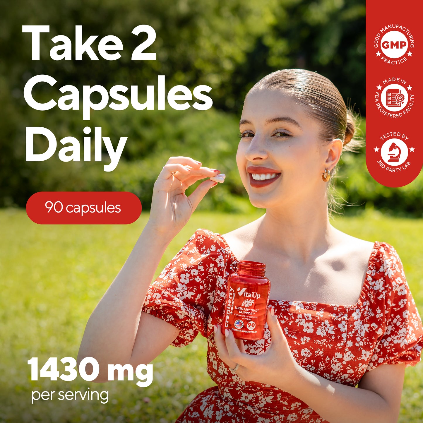 Woman holding a supplement bottle with text about daily capsule intake outdoors.