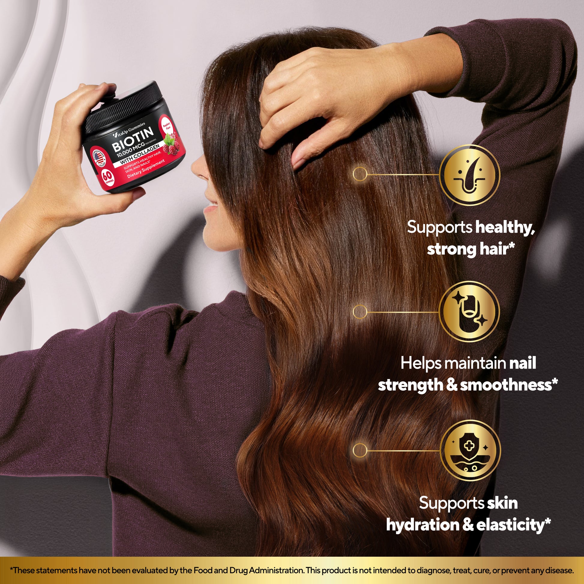 Woman holding VitaUp Biotin gummies jar with text: Supports hair, nail strength, and skin hydration