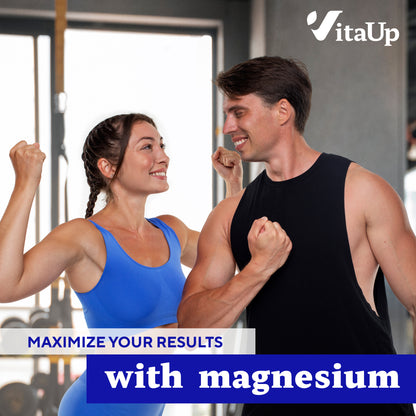  Fit man and woman in workout attire flexing and smiling at each other in a gym setting. Text overlay says "Maximize your results with magnesium" and features VitaUp branding.