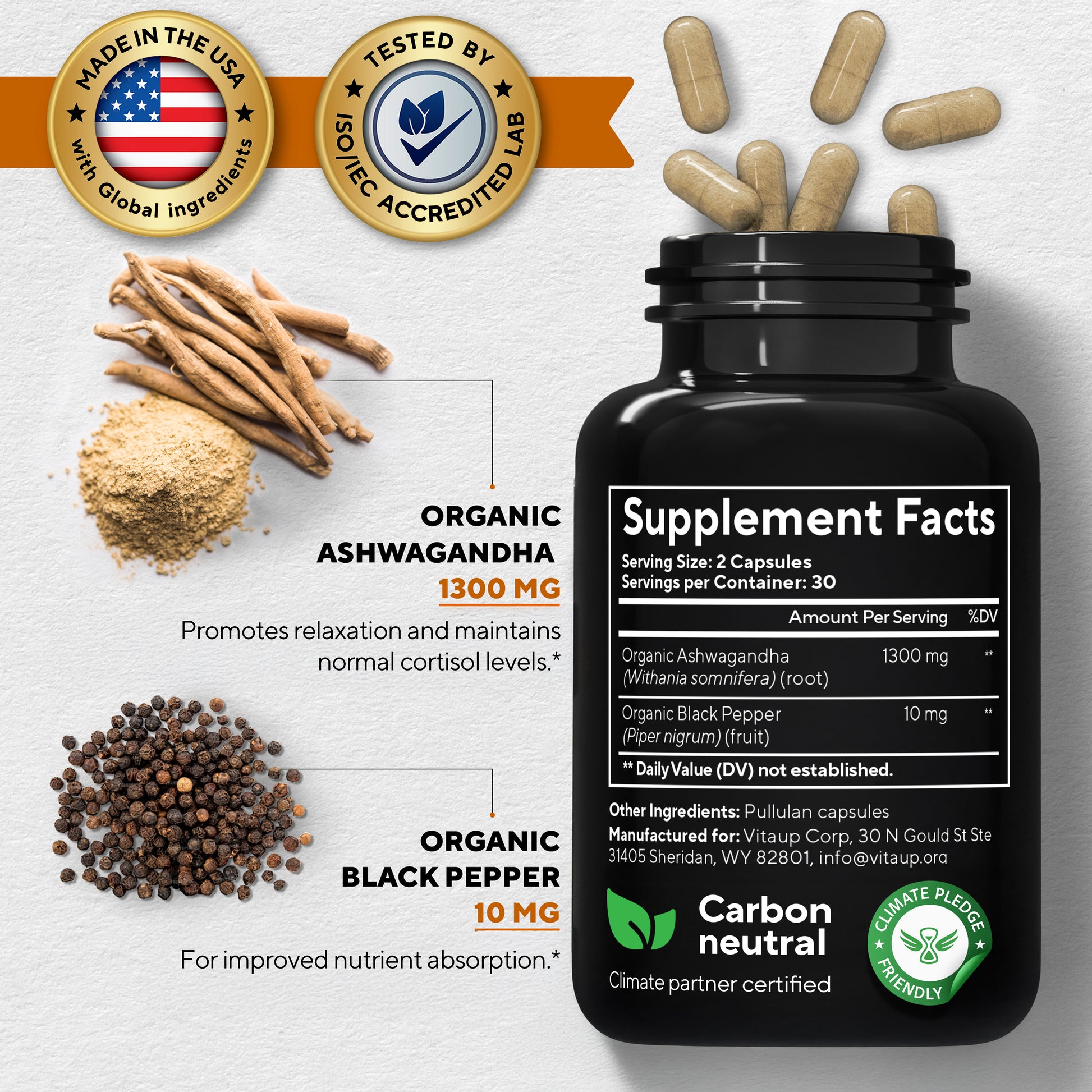 VitaUp Ashwagandha supplement product image highlighting 1300 mg organic ashwagandha and 10 mg organic black pepper per serving. Claims include cortisol level support and enhanced nutrient absorption. Features “Made in the USA with global ingredients,” “ISO/IEC accredited lab tested,” and “Carbon neutral” badges. Capsules shown above an open black bottle.